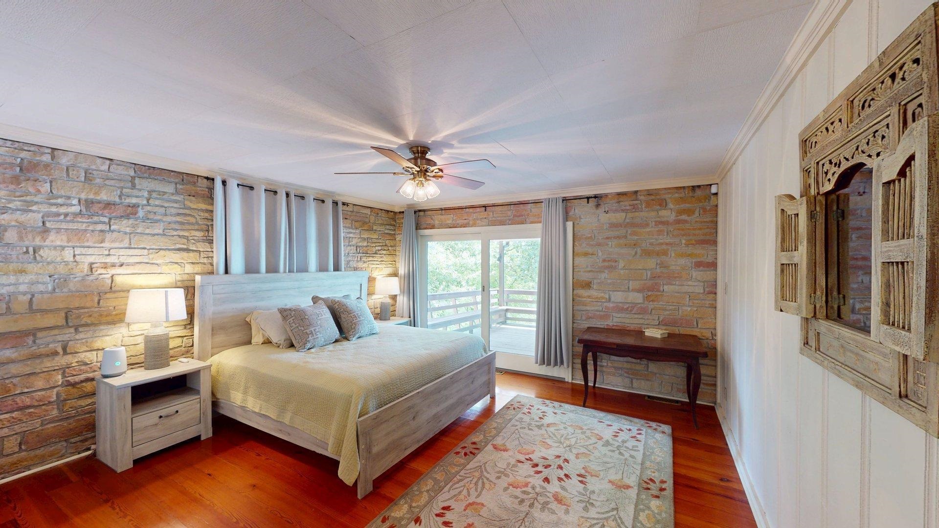 50 Cr 396 Road Iuka, MS 38852 - Photo 15 of 40 a bed room with a bed and a chair