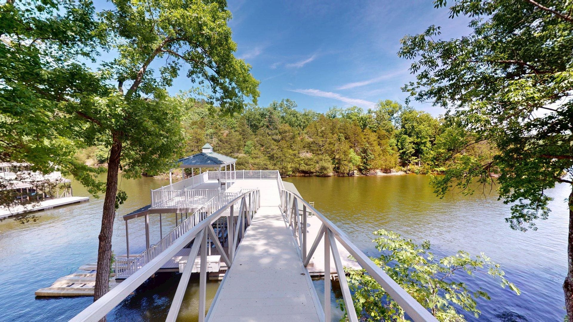 50 Cr 396 Road Iuka, MS 38852 - Photo 37 of 40 a view of a balcony with wooden floor and lake view