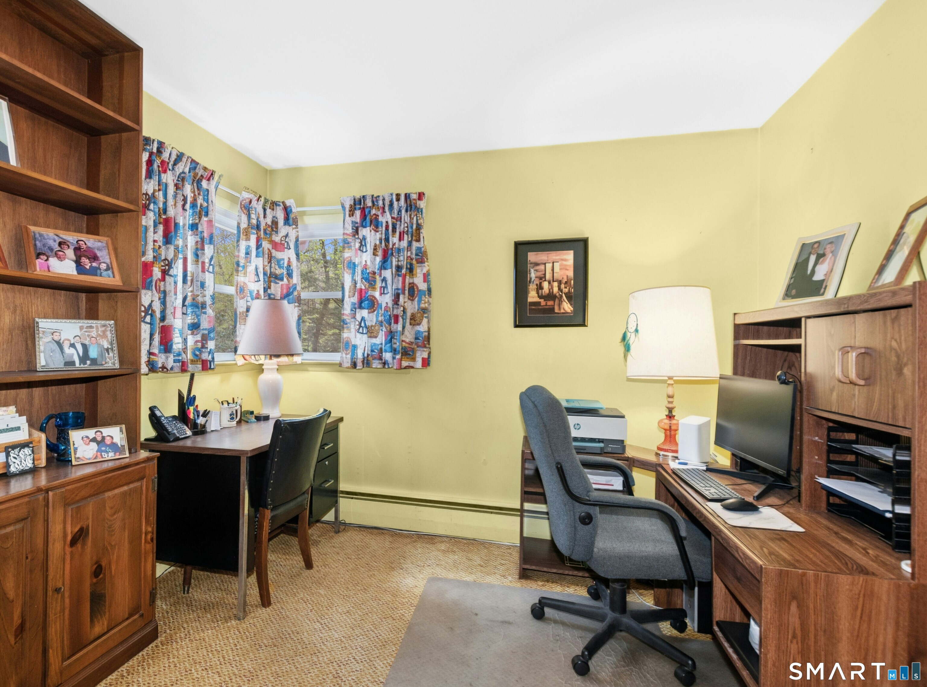 15 Limestone Terrace Ridgefield, CT 06877 - Photo 16 of 32 a view of a workspace with furniture and a window