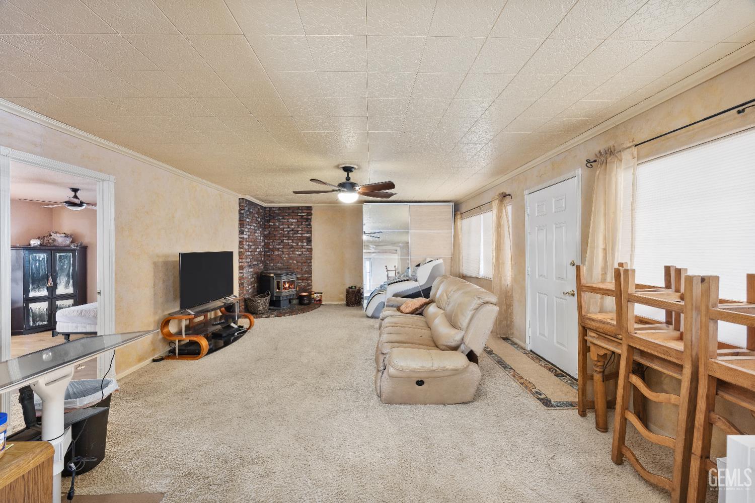 Undisclosed Address Edwards, CA 93523 - Photo 12 of 71 a bedroom with furniture and a flat screen tv