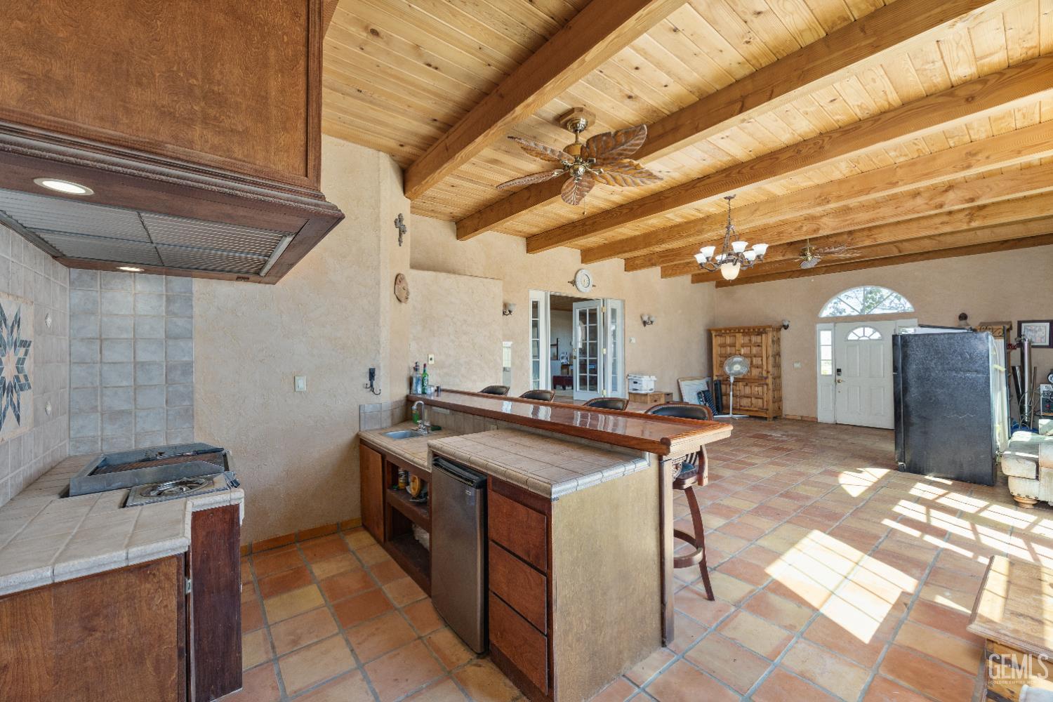 Undisclosed Address Edwards, CA 93523 - Photo 35 of 71 a kitchen with a stove and a table