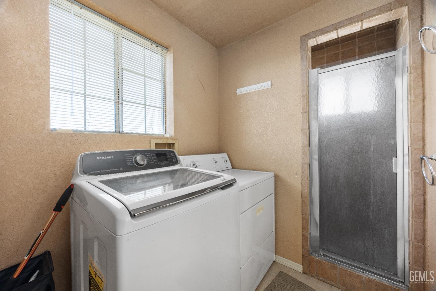 Undisclosed Address Edwards, CA 93523 - Photo 42 of 71 a utility room with dryer and washer