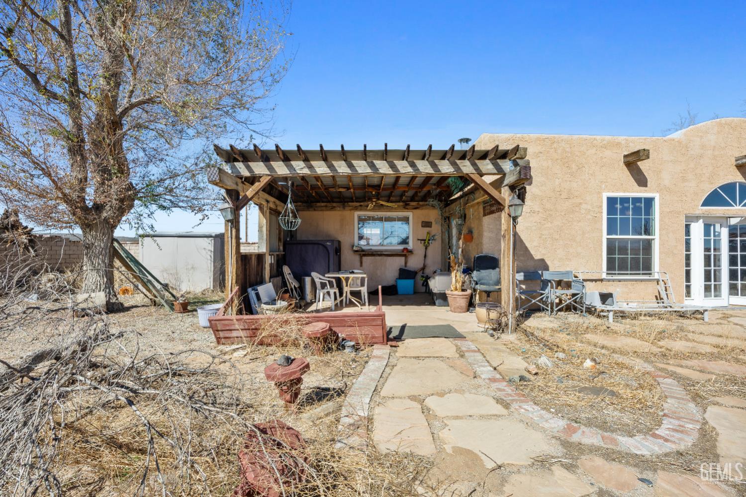 Undisclosed Address Edwards, CA 93523 - Photo 44 of 71 a view of a chairs and tables in the patio