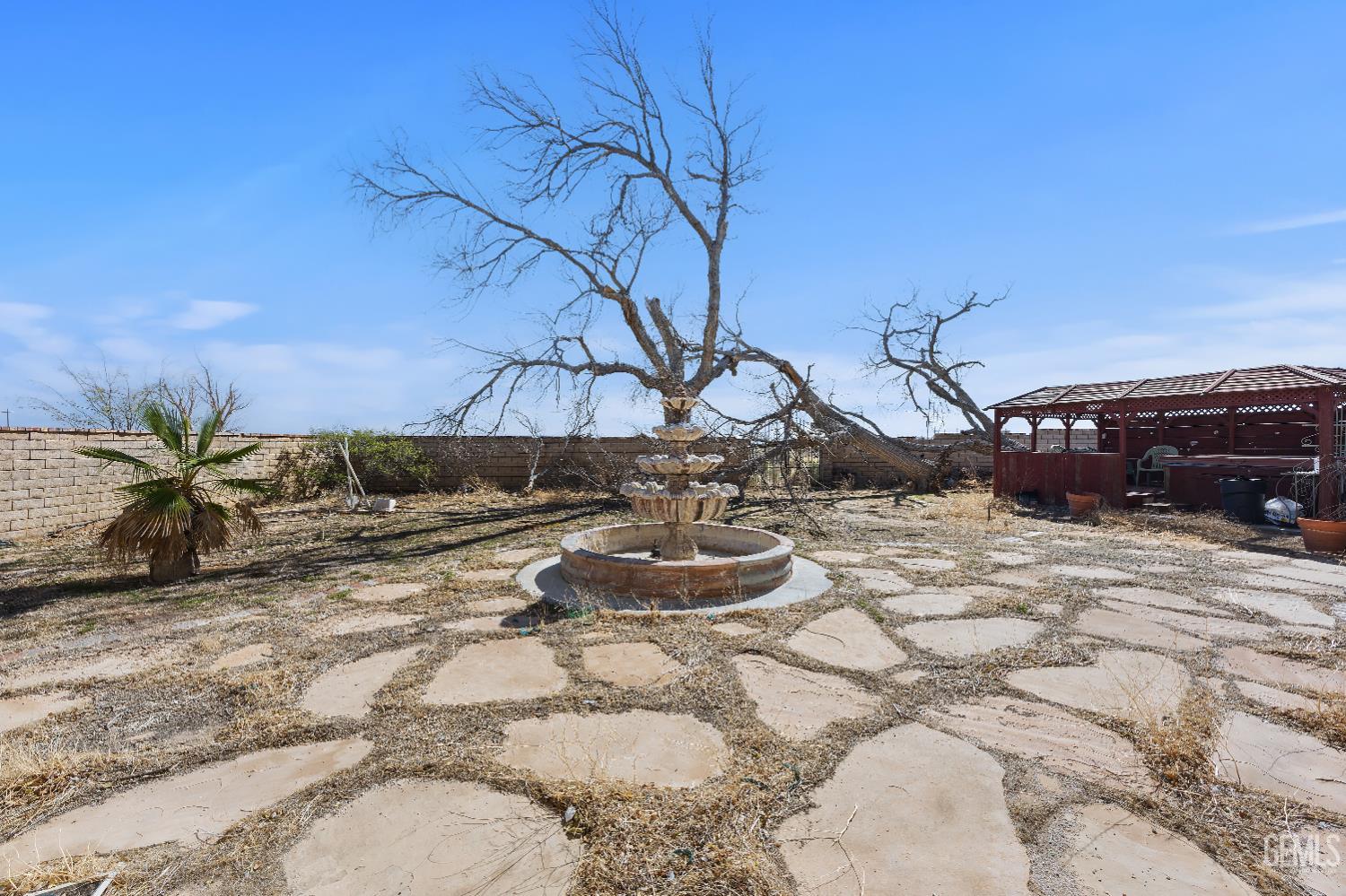 Undisclosed Address Edwards, CA 93523 - Photo 49 of 71 a view of a backyard of the house