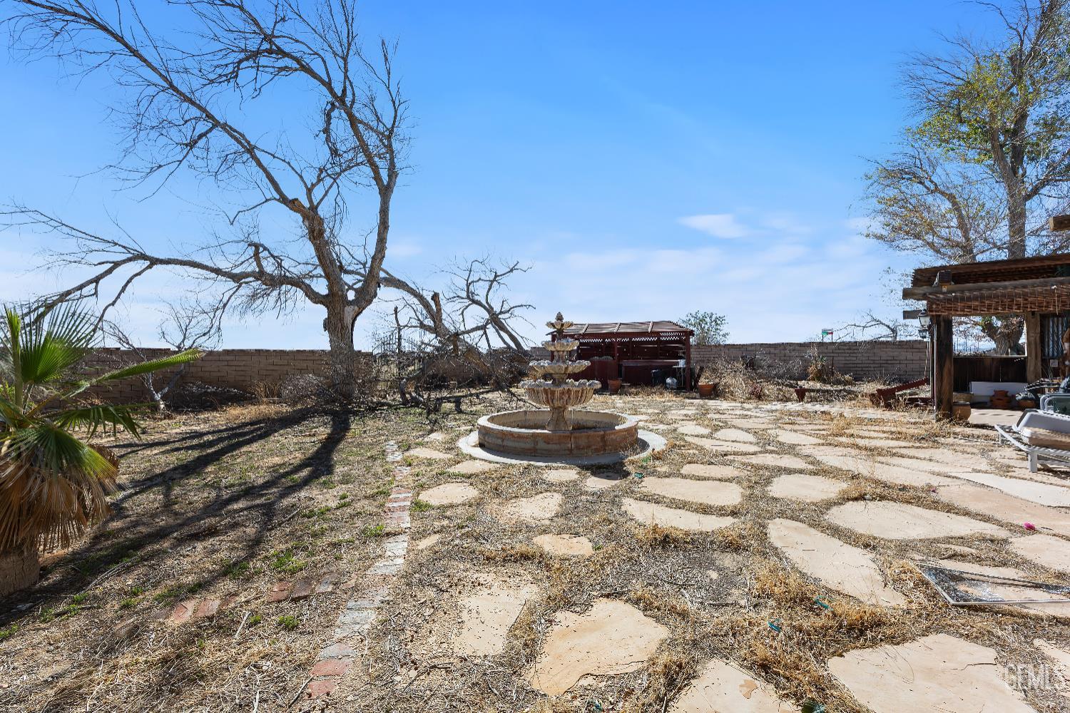 Undisclosed Address Edwards, CA 93523 - Photo 50 of 71 a view of a backyard of the house