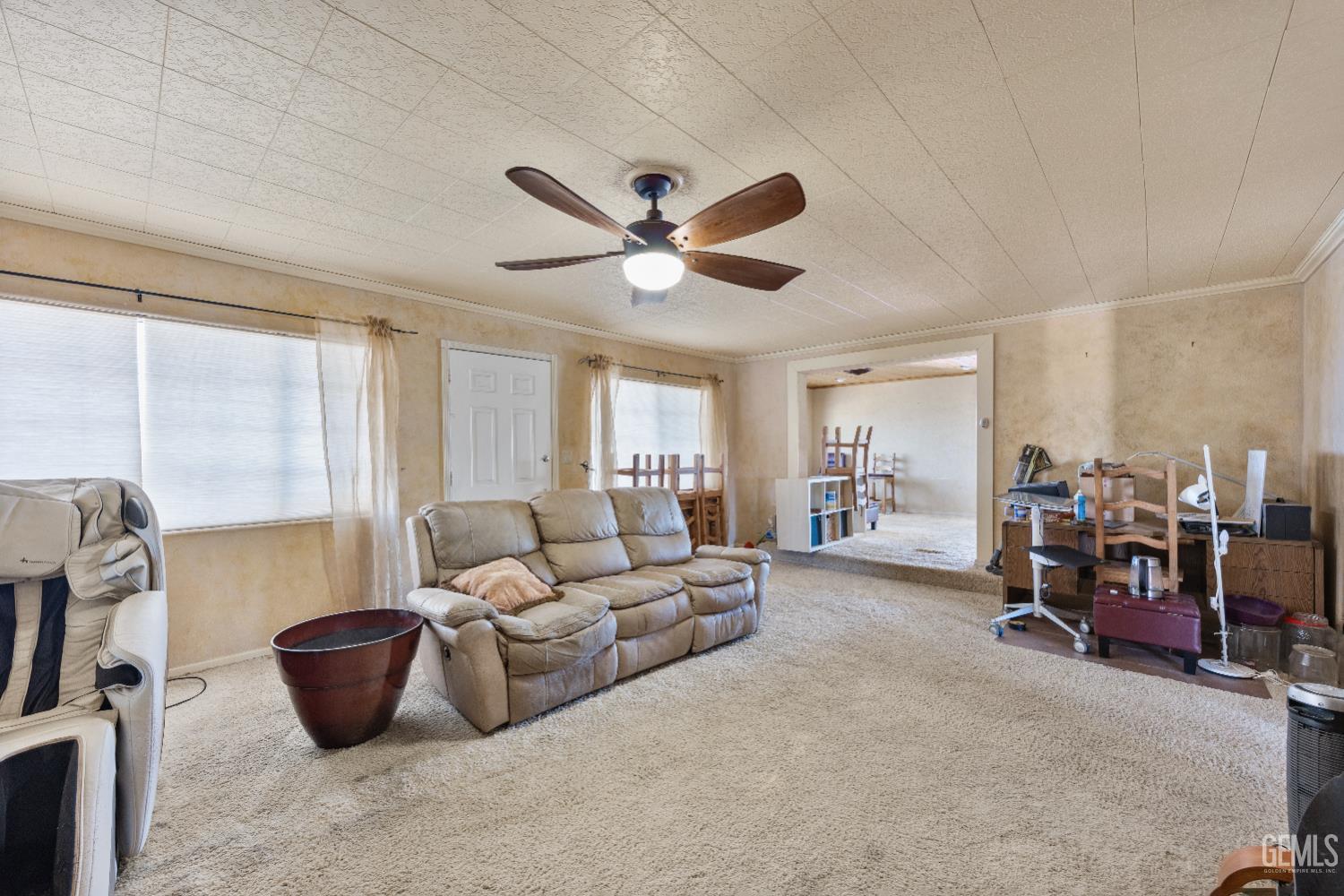 Undisclosed Address Edwards, CA 93523 - Photo 5 of 71 a living room with furniture and a large window