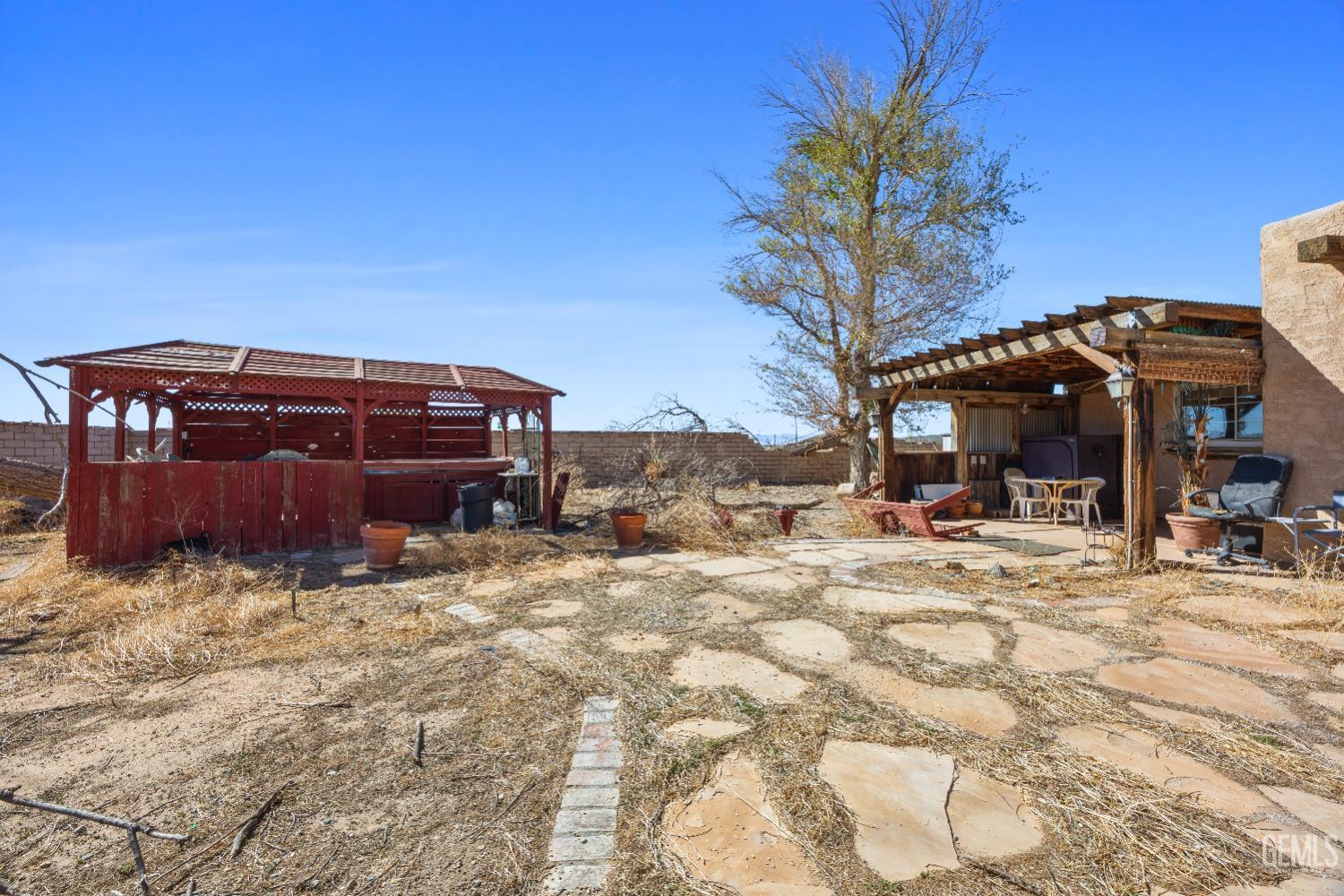 Undisclosed Address Edwards, CA 93523 - Photo 51 of 71 a view of a house with a yard