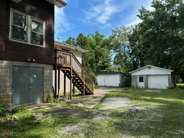 8526 Fosdick Road Cleveland, OH 44125 - Photo 13 of 25 View of yard with an outbuilding
