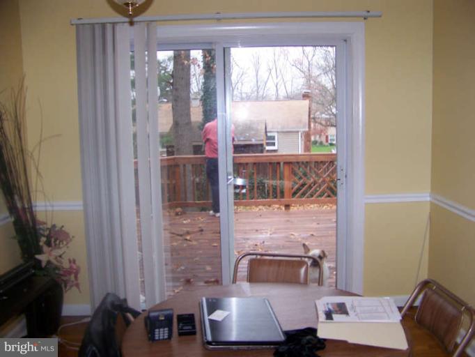 3410 Metzerott Road College Park, MD 20740 - Photo 13 of 13 Dining Room (doors to deck area)