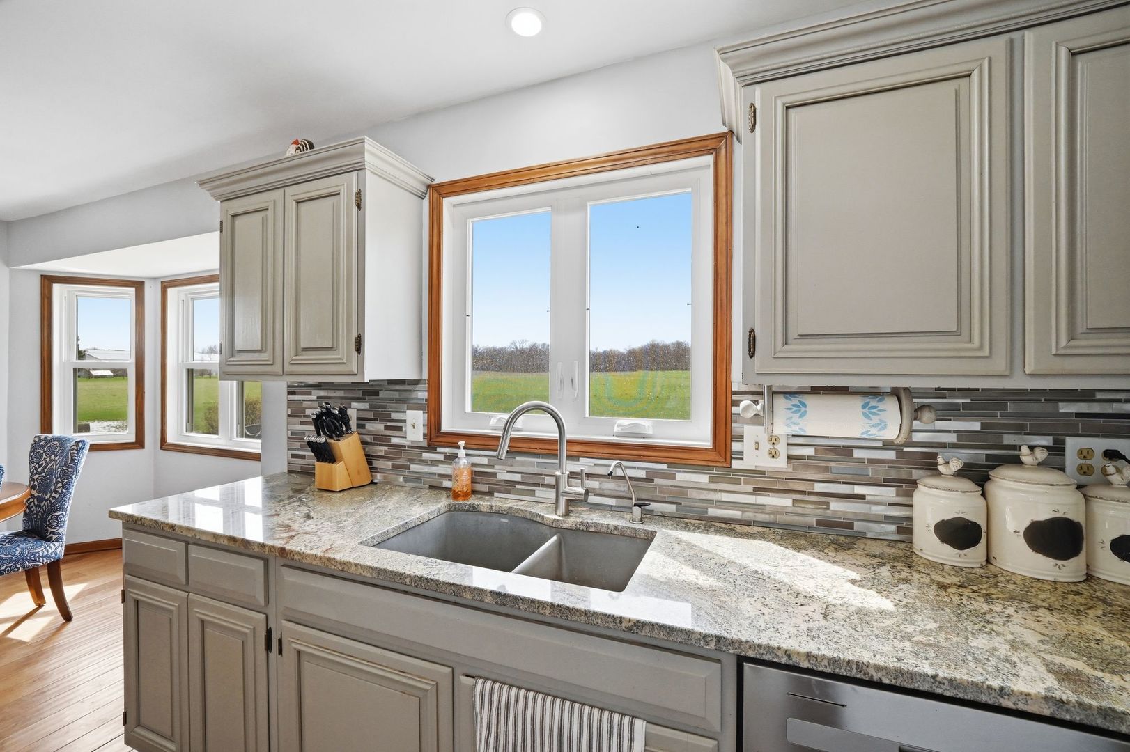 8N316 McGough Road Maple Park, IL 60151 - Photo 17 of 46 a kitchen with sink a window and cabinets