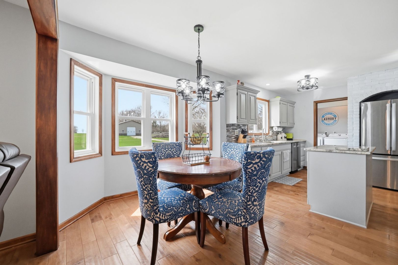 8N316 McGough Road Maple Park, IL 60151 - Photo 18 of 46 a dining room with furniture window and wooden floor