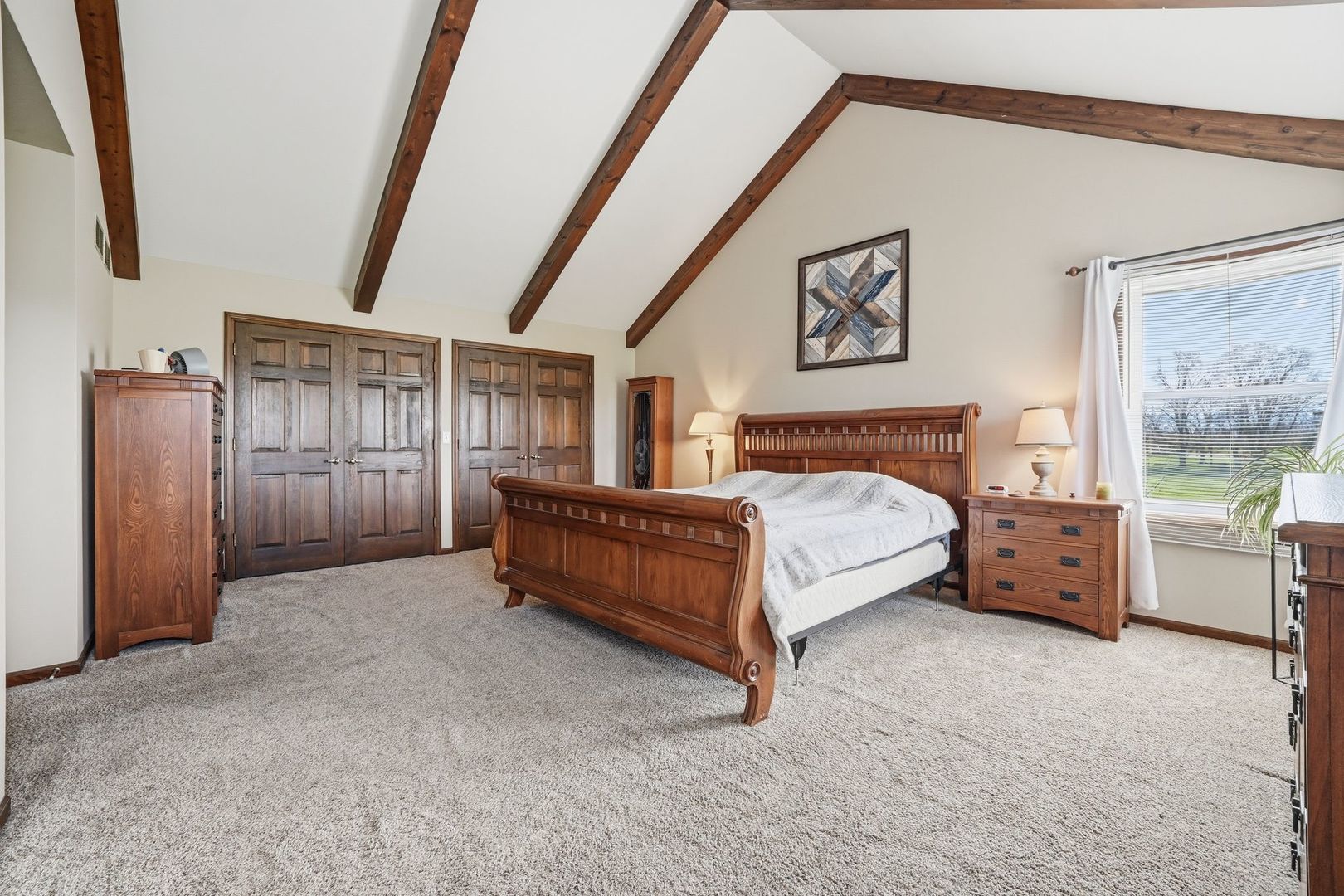 8N316 McGough Road Maple Park, IL 60151 - Photo 27 of 46 a spacious bedroom with a bed and a large window
