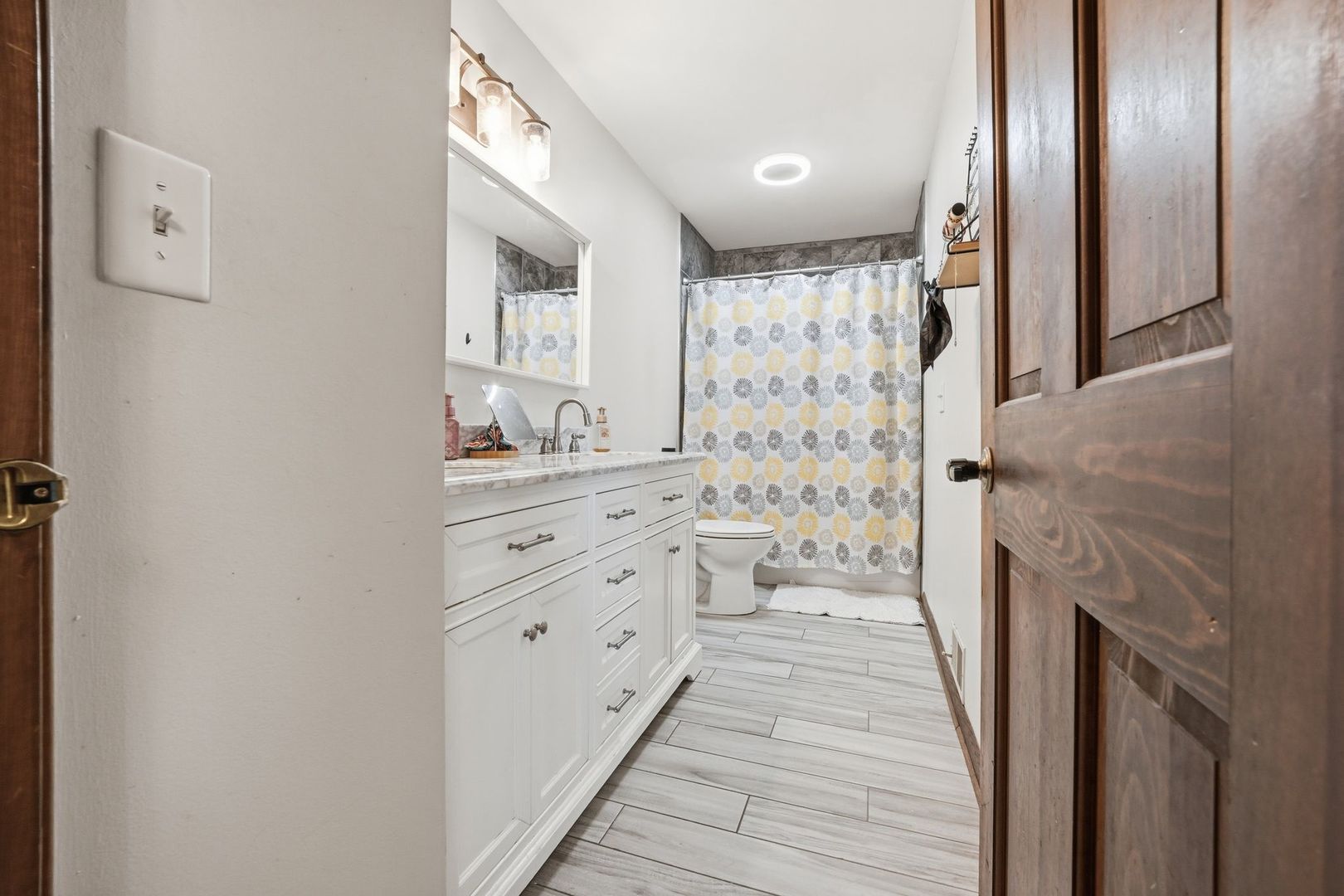 8N316 McGough Road Maple Park, IL 60151 - Photo 31 of 46 a bathroom with a sink and a mirror
