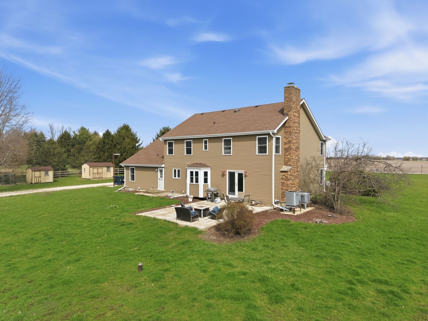 8N316 McGough Road Maple Park, IL 60151 - Photo 42 of 46 a front view of a house with garden