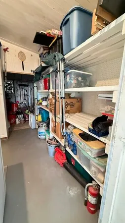 a backyard of a house with portable swimming pool and outdoor seating