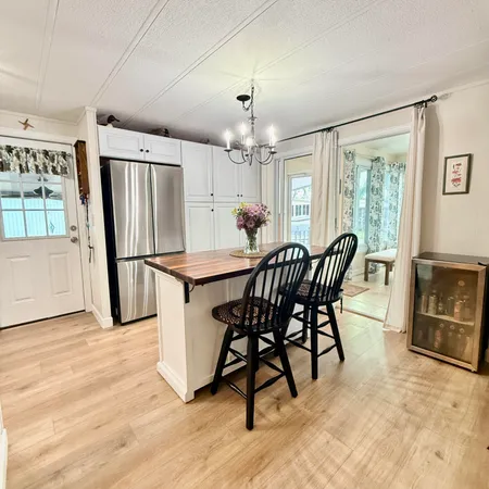 a living room with a couch and a flat screen tv
