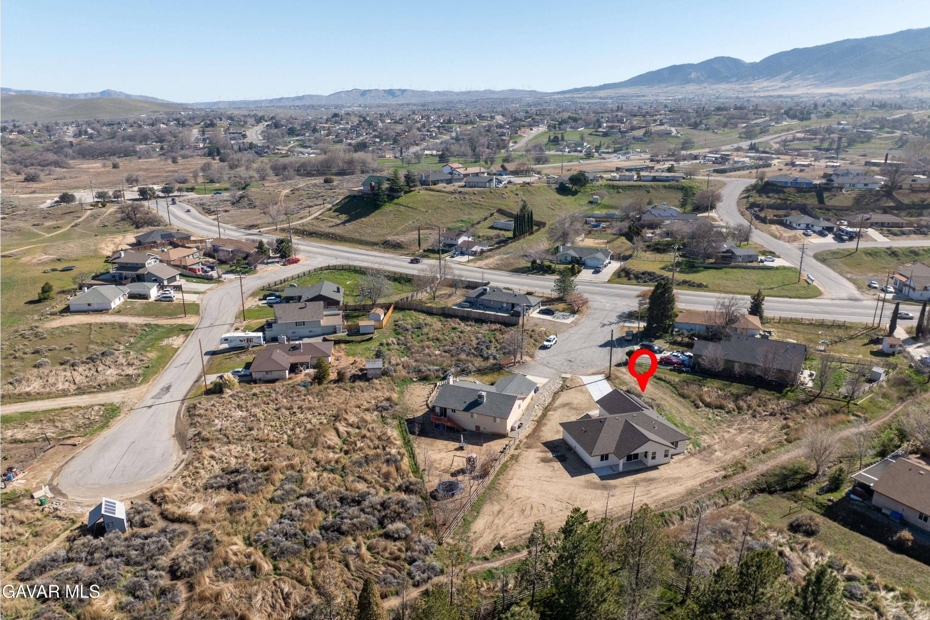 22613 Royal Place Tehachapi, CA 93561 - Photo 22 of 26 an aerial view of a houses with a street