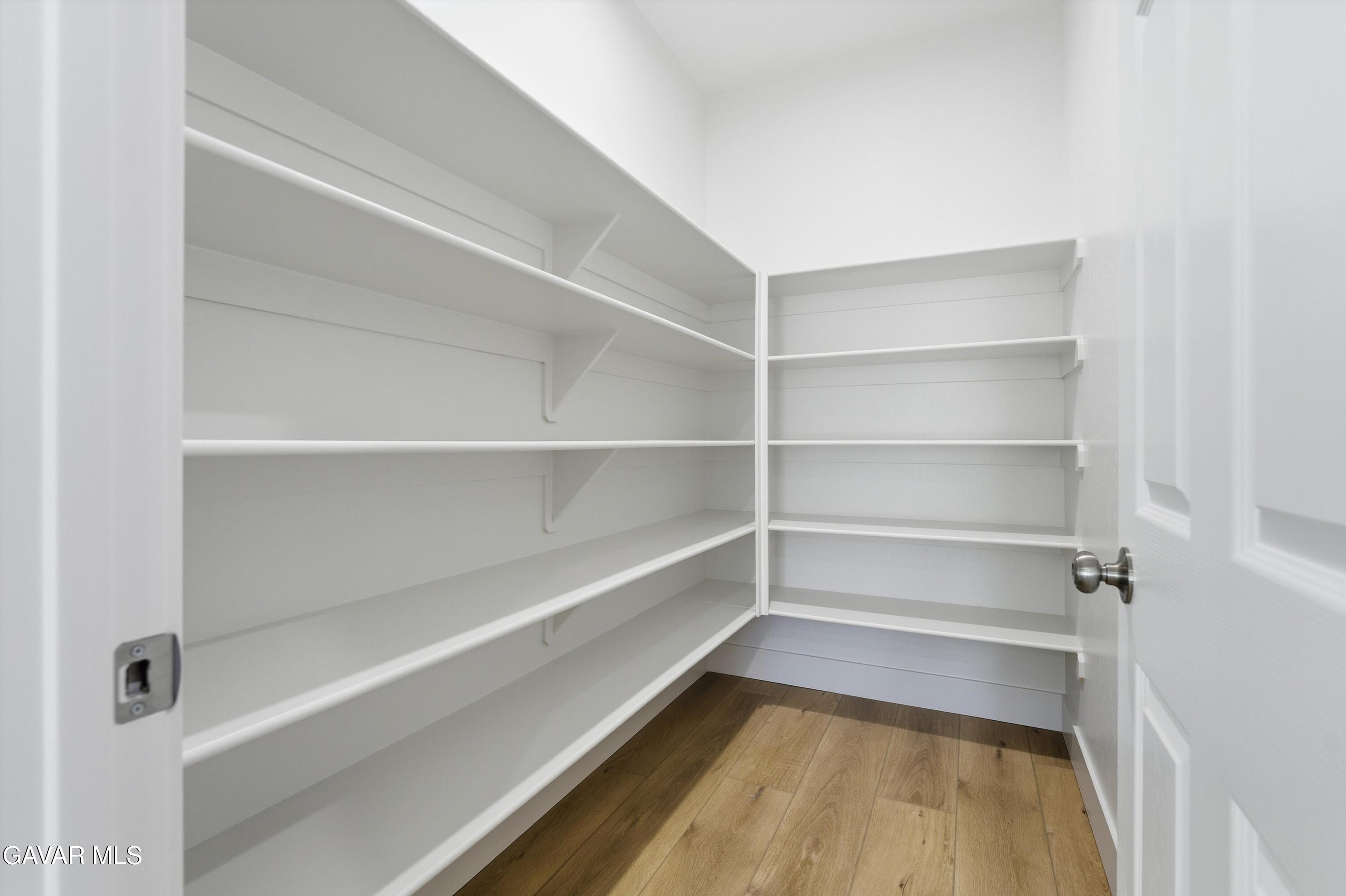 22613 Royal Place Tehachapi, CA 93561 - Photo 7 of 26 a view of a room with shelves