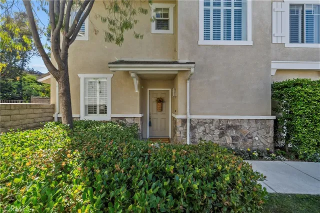 front view of a house with a small yard