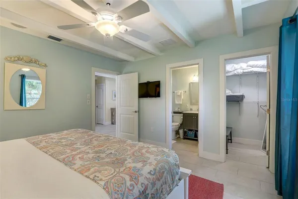 a very nice looking dining room with a large window