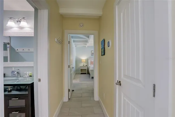 a bedroom with a large bed and a couch