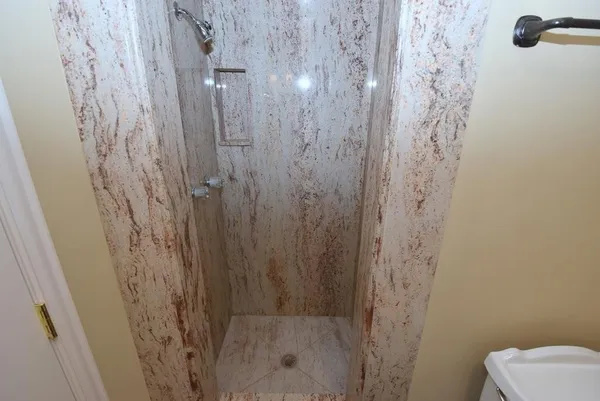 a bathroom with a shower curtain