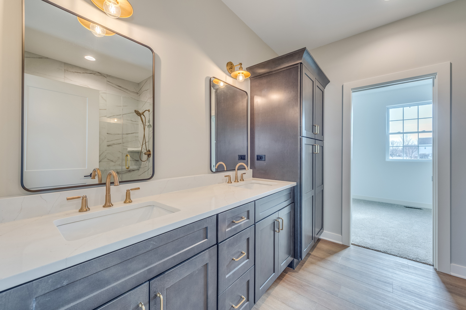 1076 Freedom Road Elburn, IL 60119 - Photo 18 of 31 a bathroom with double vanity sinks and a mirror