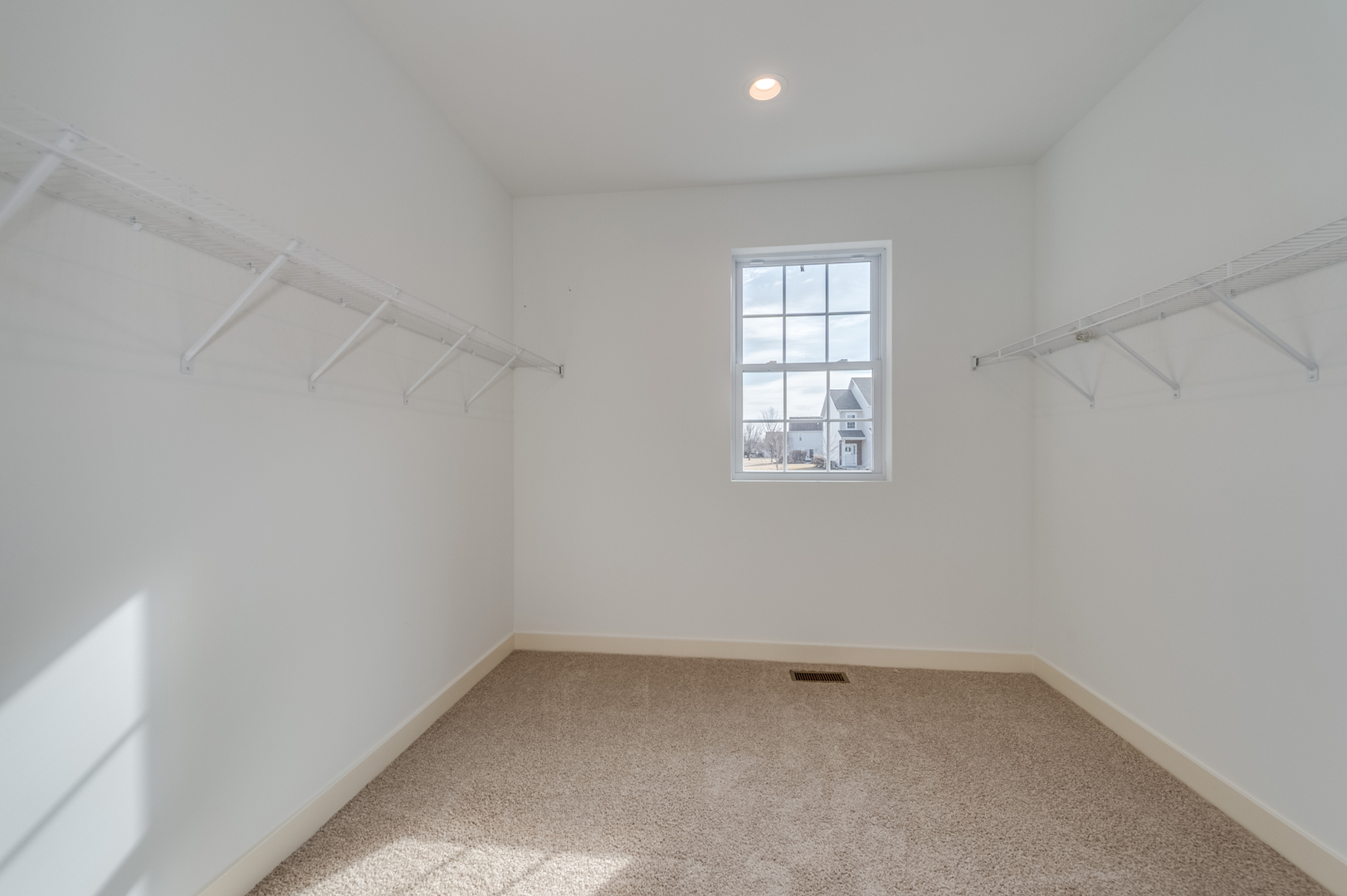 1076 Freedom Road Elburn, IL 60119 - Photo 21 of 31 an empty room with a window