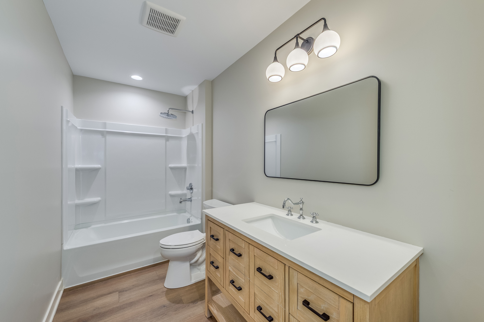 1076 Freedom Road Elburn, IL 60119 - Photo 26 of 31 a bathroom with a sink a toilet and a mirror