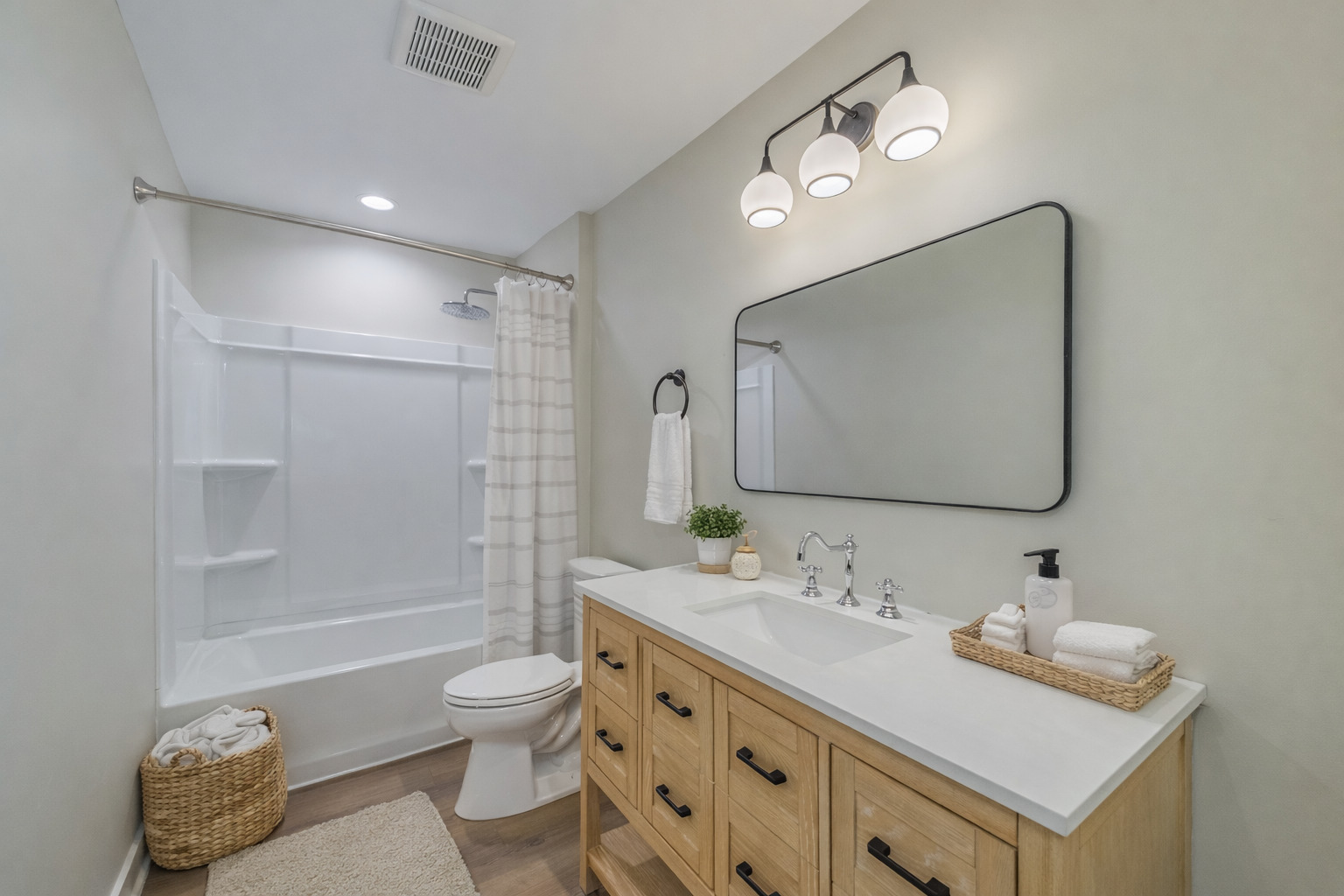 1076 Freedom Road Elburn, IL 60119 - Photo 27 of 31 a bathroom with a double vanity sink toilet mirror and bathtub