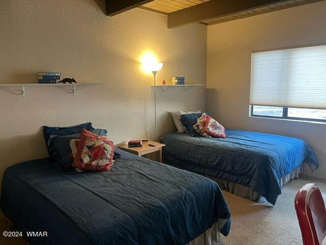 2820 Sports Village Loop Pinetop, AZ 85935 - Photo 19 of 24 a bedroom with two bed and window