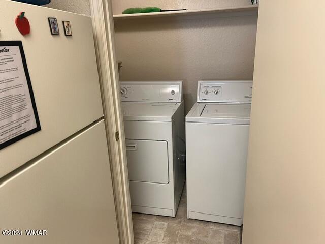 2820 Sports Village Loop Pinetop, AZ 85935 - Photo 23 of 24 a utility room with dryer and washer