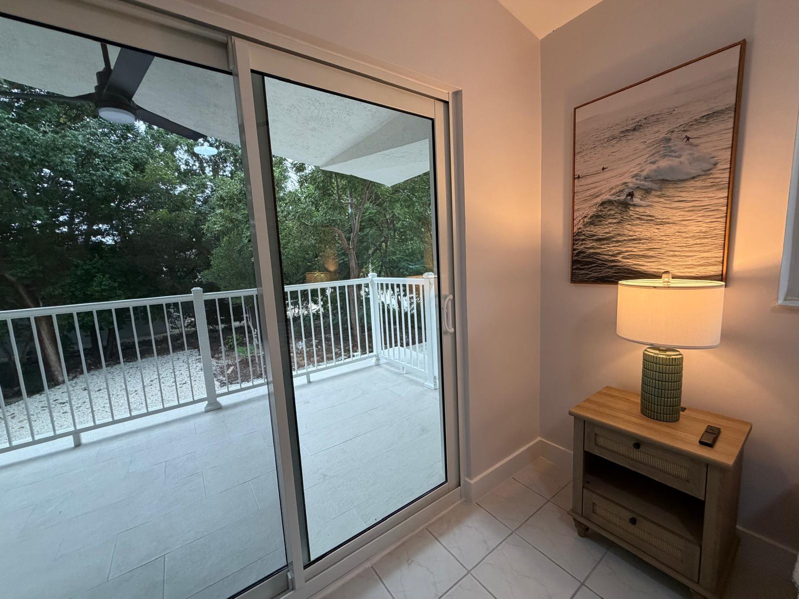 219 South Bay Harbor Drive, Unit B Key Largo, FL 33037 - Photo 8 of 16 a view of front door and bedroom