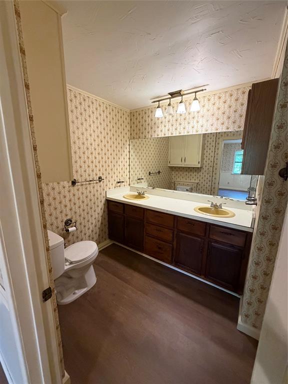 257 West Acres Road Gun Barrel City, TX 75156 - Photo 20 of 22 a bathroom with a double vanity sink mirror and toilet