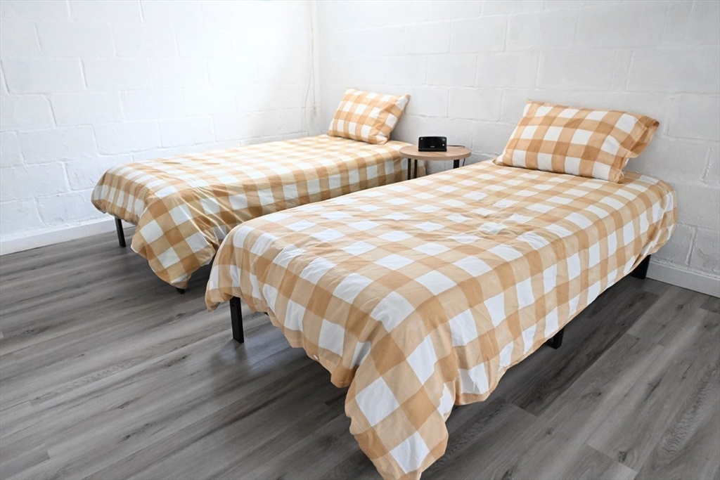 7 Glendale Road Wareham, MA 02558 - Photo 21 of 27 a bedroom with two beds and wooden floor