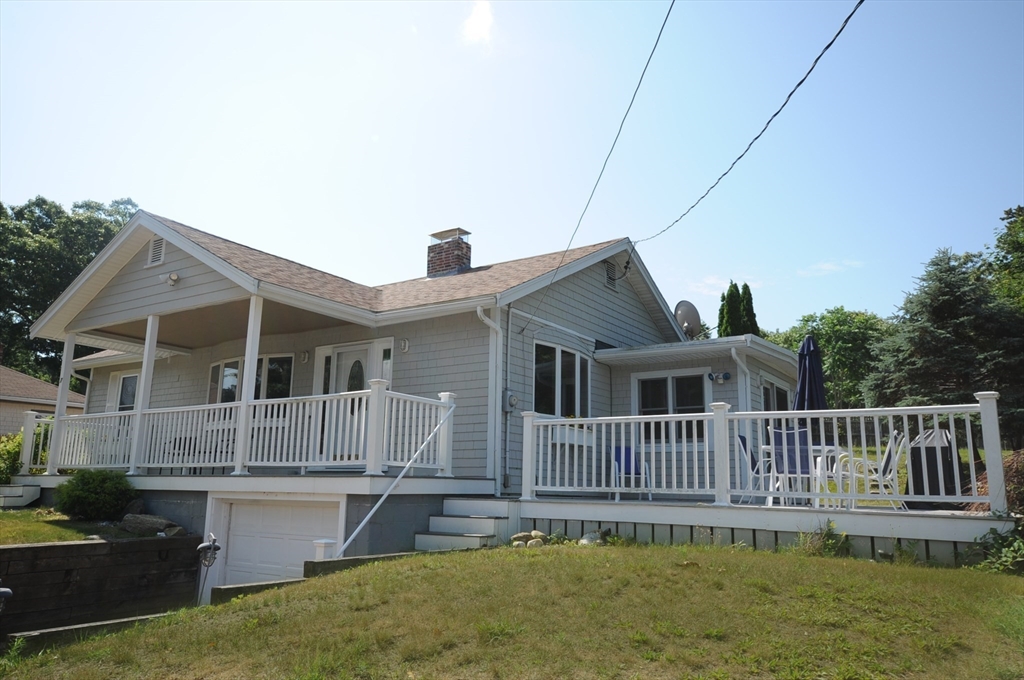 7 Glendale Road Wareham, MA 02558 - Photo 4 of 27 a house view with a garden space
