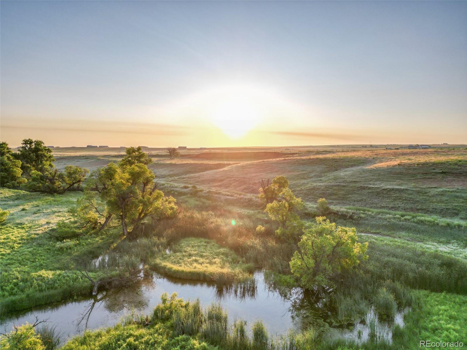 Pass Me By Road Strasburg, CO 80136 - Photo 2 of 46 a view of an ocean