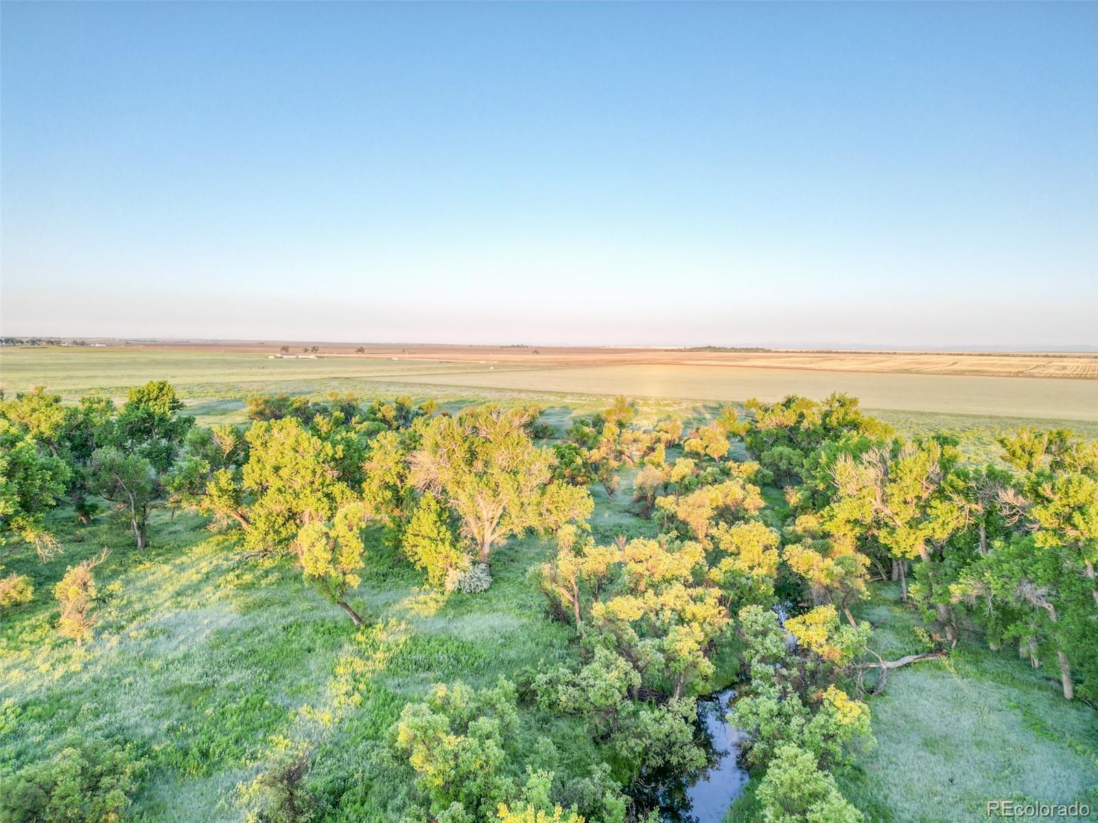 Pass Me By Road Strasburg, CO 80136 - Photo 30 of 46 an aerial view of residential building and ocean