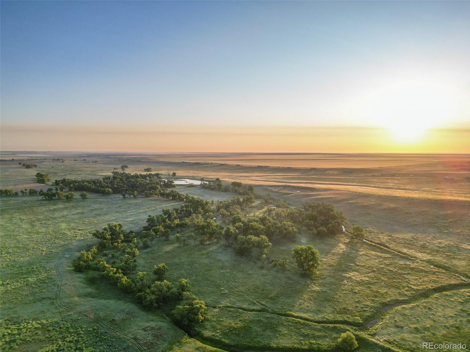 Pass Me By Road Strasburg, CO 80136 - Photo 38 of 46 a view of an ocean