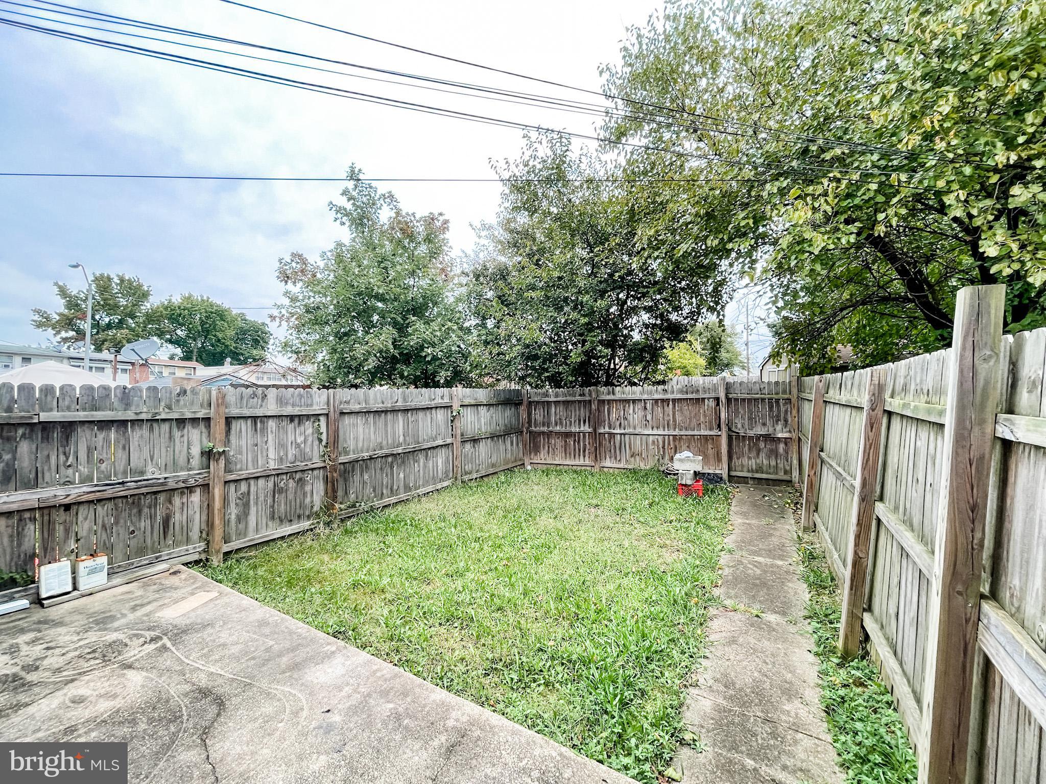 4 Kingston Road New Castle, DE 19720 - Photo 14 of 15 Fenced backyard with grass and patio