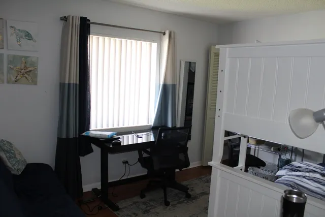 a room with furniture and window