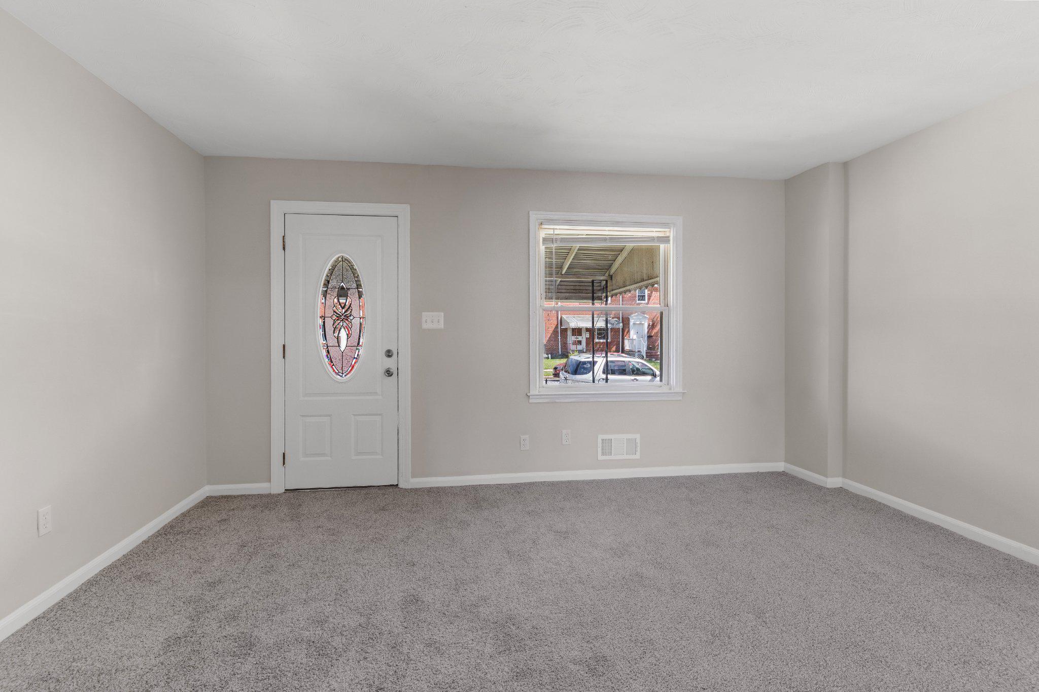2147 Coralthorn Road Middle River, MD 21220 - Photo 7 of 23 Inviting entryway and living room space.