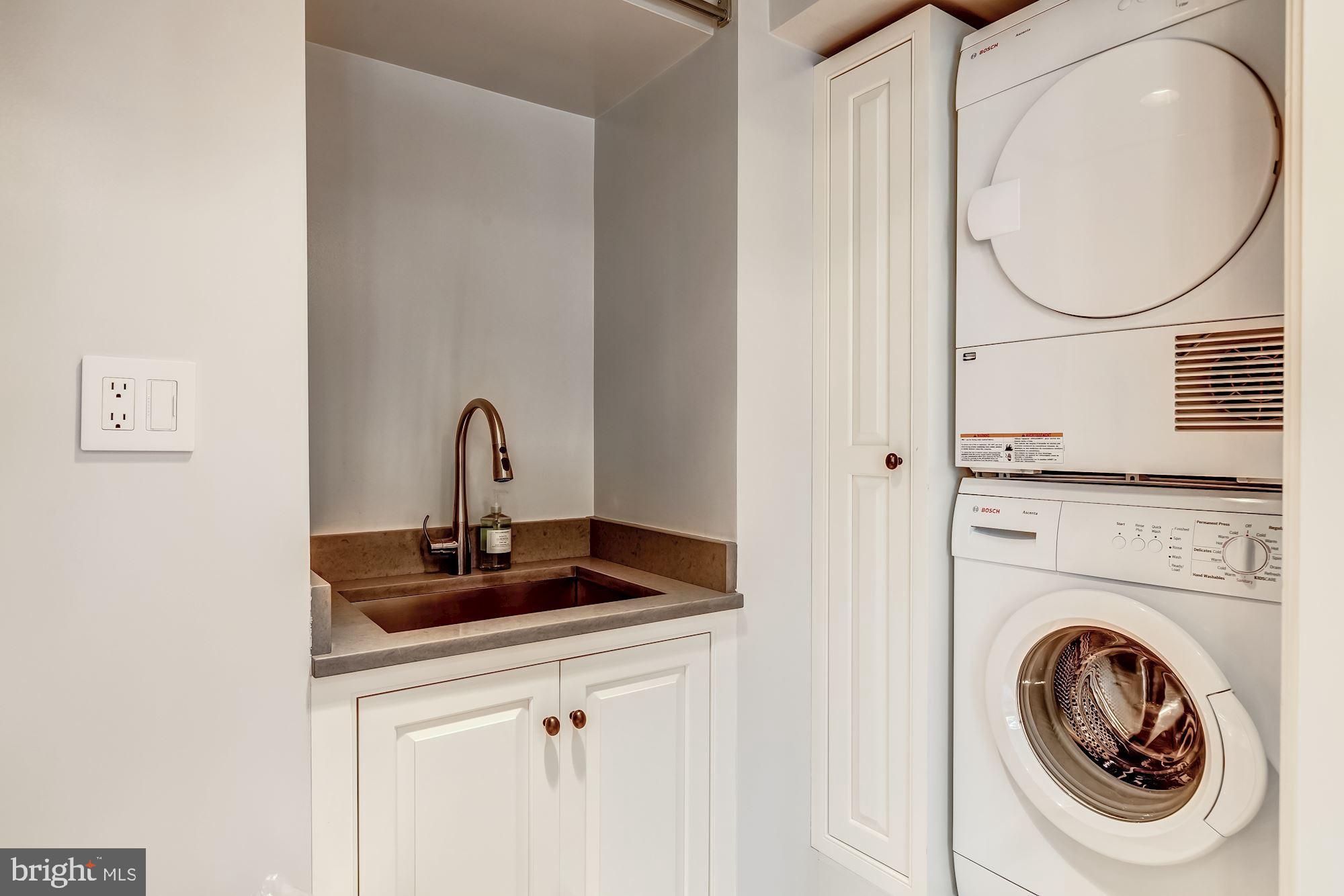 2130 Bancroft Place Northwest Washington, DC 20008 - Photo 18 of 35 Laundry Room with Built-In Ironing Board