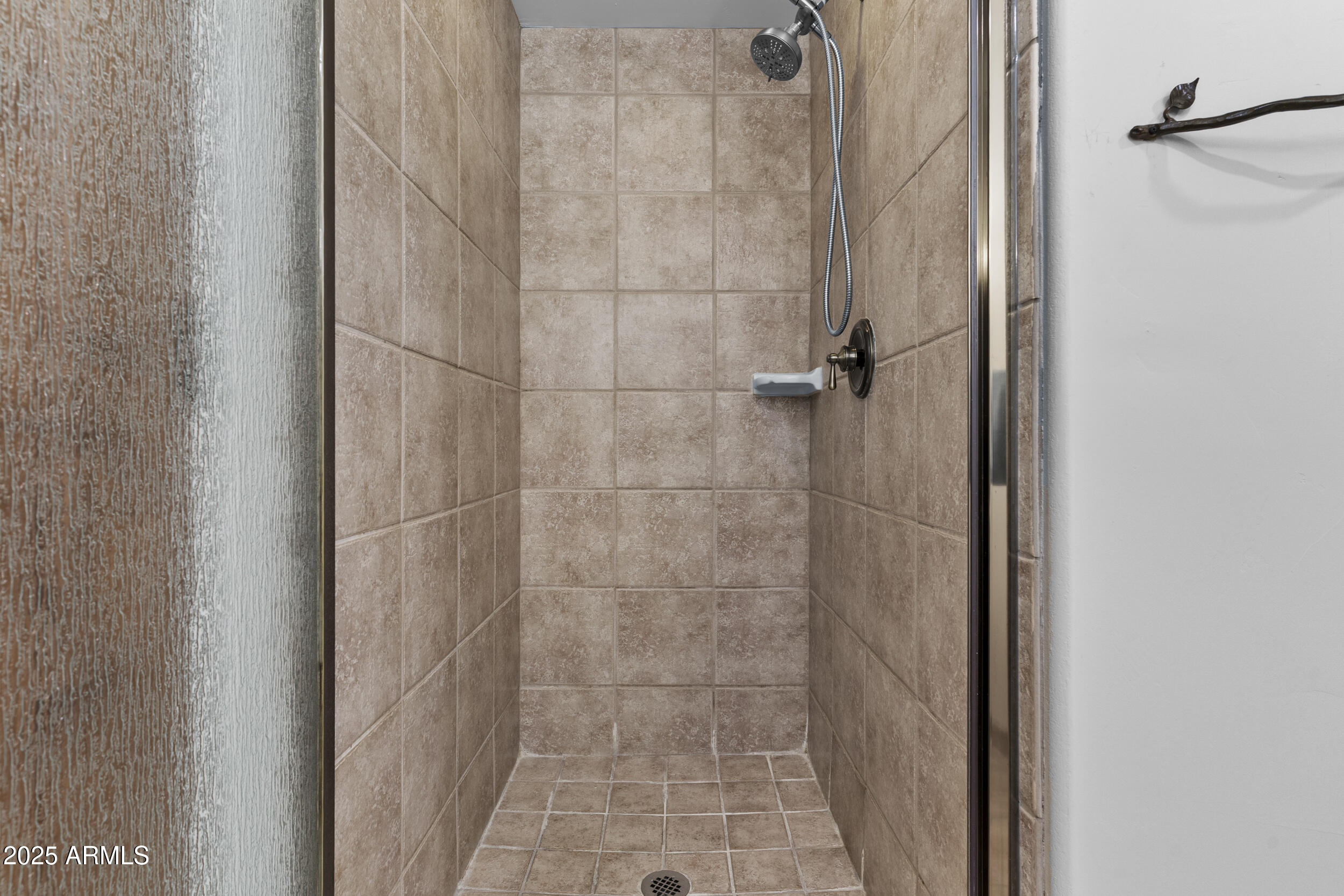 36601 North Mule Train Road, Unit D18 Carefree, AZ 85377 - Photo 31 of 57 a bathroom with a shower