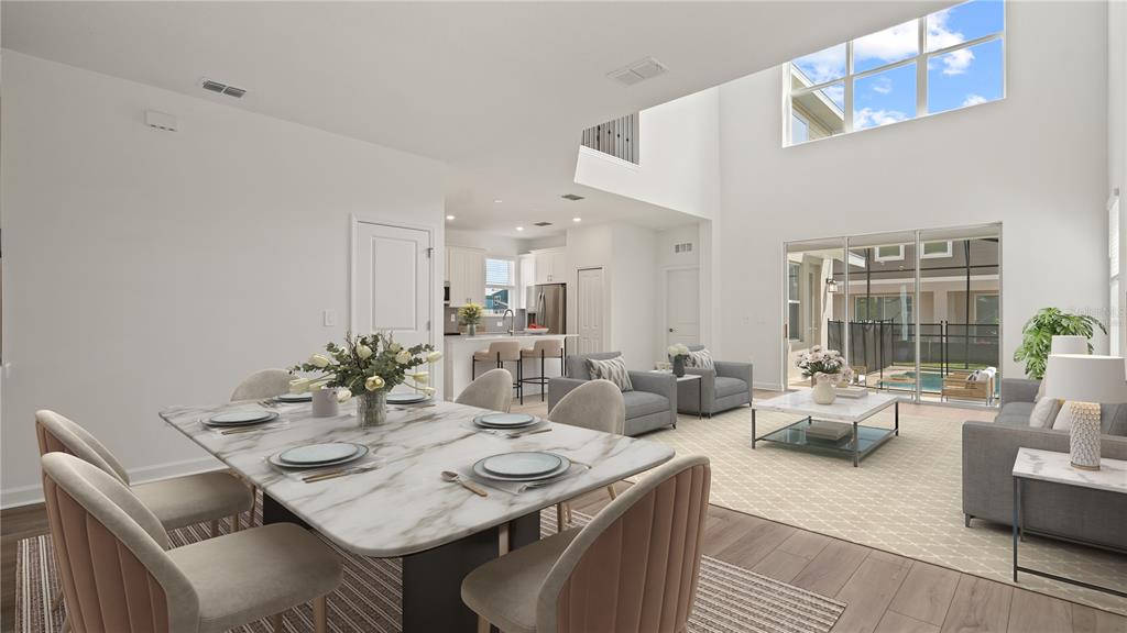 7851 Poplin Street Kissimmee, FL 34747 - Photo 5 of 36 a living room with furniture and a large window