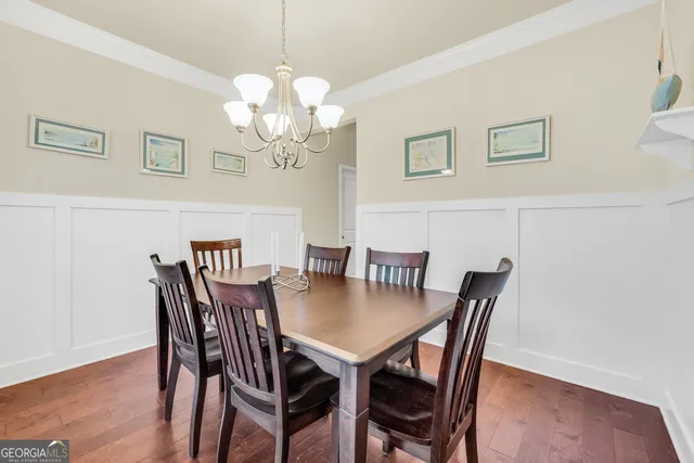 a spacious bedroom with a bed and a window