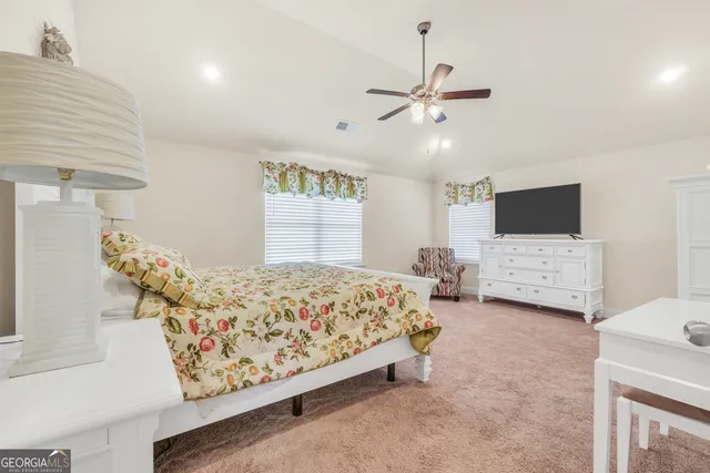 a bathroom with a bathtub a shower and a sink