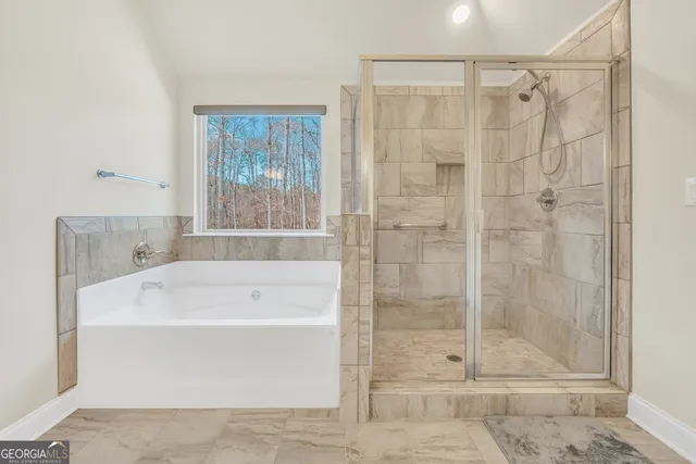 a bathroom with a granite countertop sink a mirror and vanity