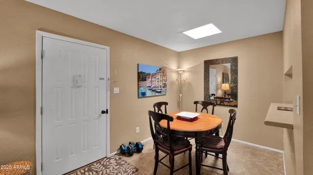a view of a dining room with furniture