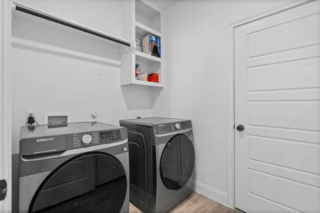 a utility room with dryer and washer